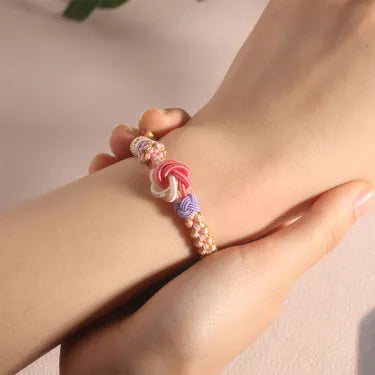 For Granddaughter - A LINK THAT CAN NEVER BE UNDONE Peach Blossom Knot Bracelet