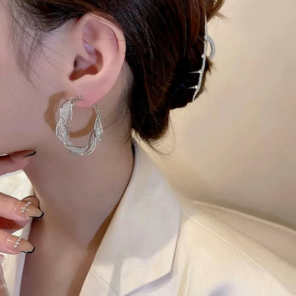 🌸Fashion Twist Earrings