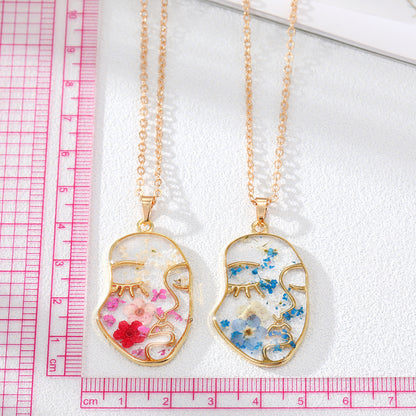 Abstract Face Forget Me Not Flower Necklace