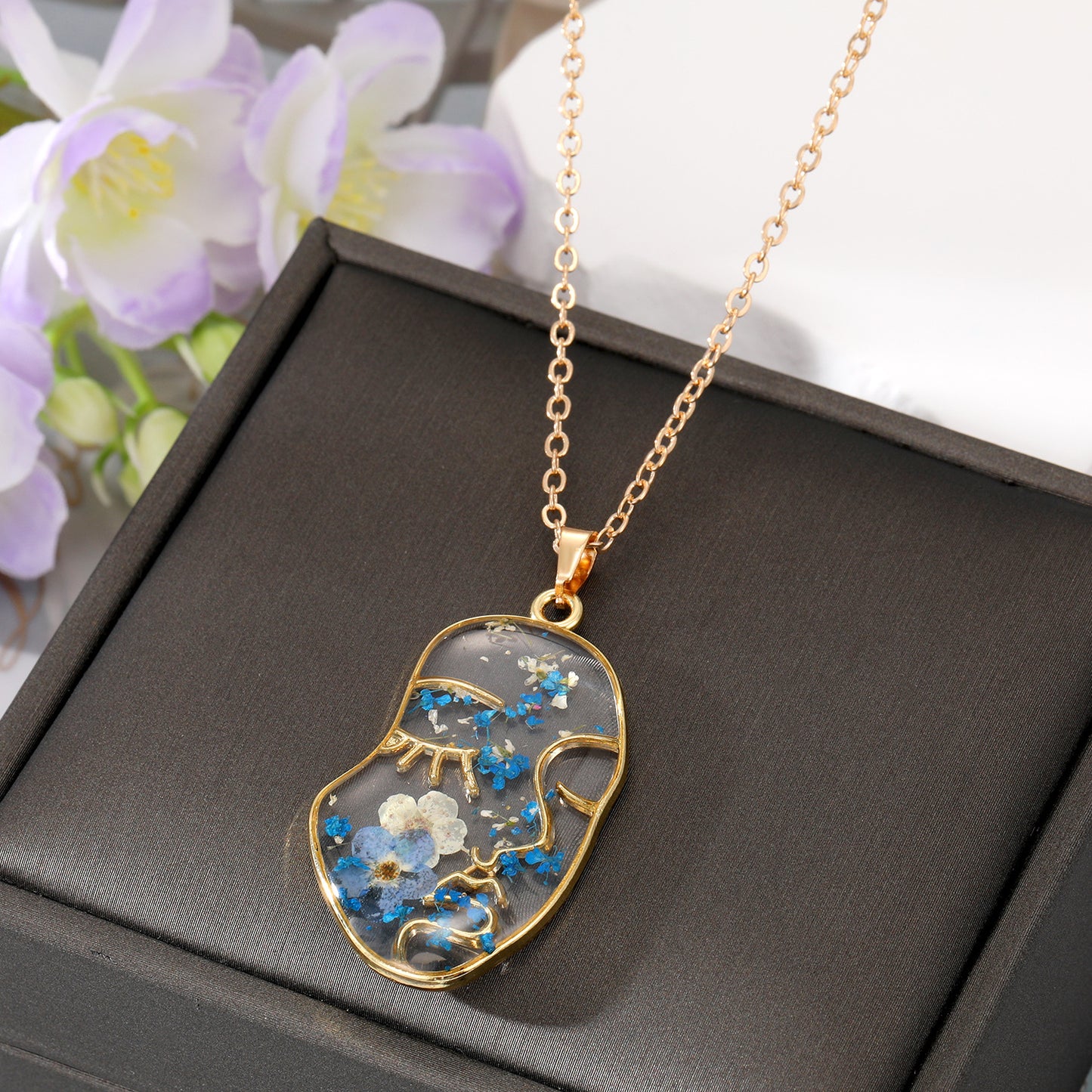 Abstract Face Forget Me Not Flower Necklace