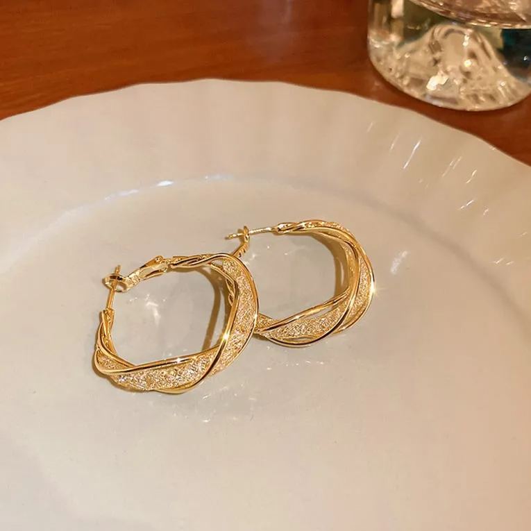 🌸Fashion Twist Earrings